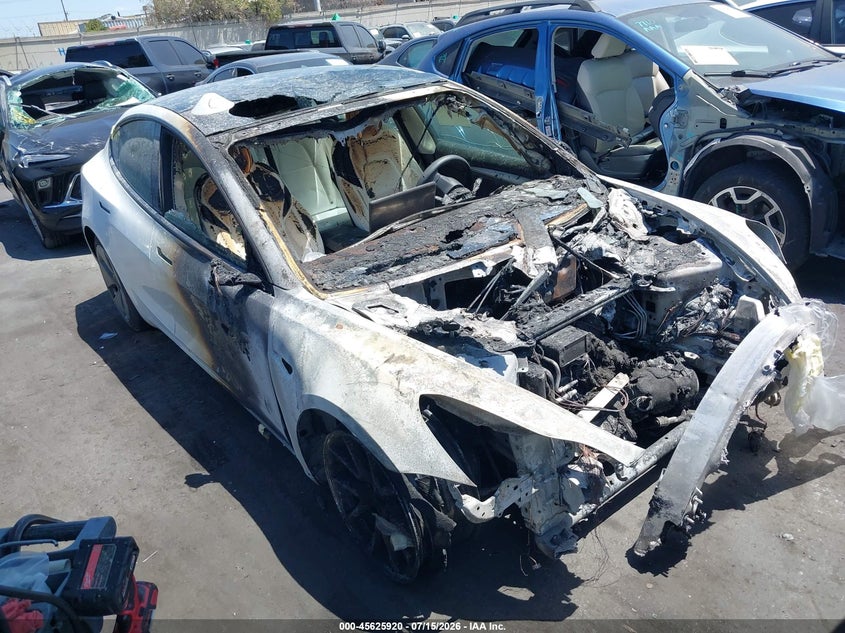 2022 Tesla Model 3 VIN 5YJ3E1EB9NF198794 IAAI salvage auction — EXTERIOR BURN, Salvage Title, sold $1,700 on 2026-08-23 (photo 1)