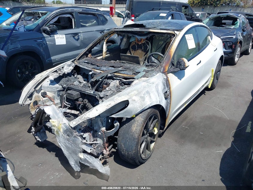 2022 Tesla Model 3 VIN 5YJ3E1EB9NF198794 IAAI salvage auction — EXTERIOR BURN, Salvage Title, sold $1,700 on 2026-08-23 (photo 2)