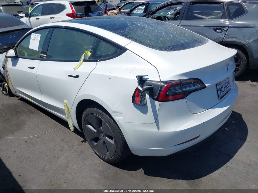 2022 Tesla Model 3 VIN 5YJ3E1EB9NF198794 IAAI salvage auction — EXTERIOR BURN, Salvage Title, sold $1,700 on 2026-08-23 (photo 3)