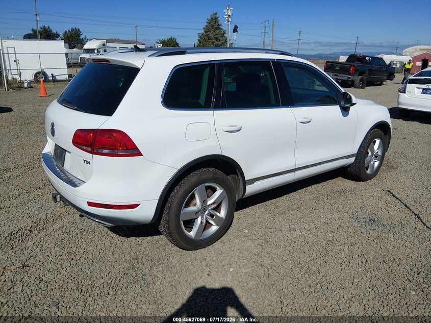2014 Volkswagen Touareg VIN WVGEP9BP8ED014692 IAAI salvage auction — NORMAL WEAR, Peddle Clear Public-Restricted (Oregon), sold $525 on 2026-07-29 (photo 4)