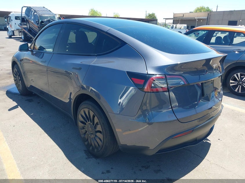 2023 Tesla Model y VIN 7SAYGDEE2PF840550 IAAI salvage auction — REAR END, Wait Title, sold $13,200 on 2026-08-31 (photo 3)