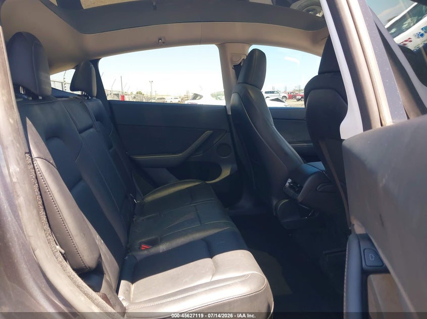 2023 Tesla Model y VIN 7SAYGDEE2PF840550 IAAI salvage auction — REAR END, Wait Title, sold $13,200 on 2026-08-31 (photo 8)