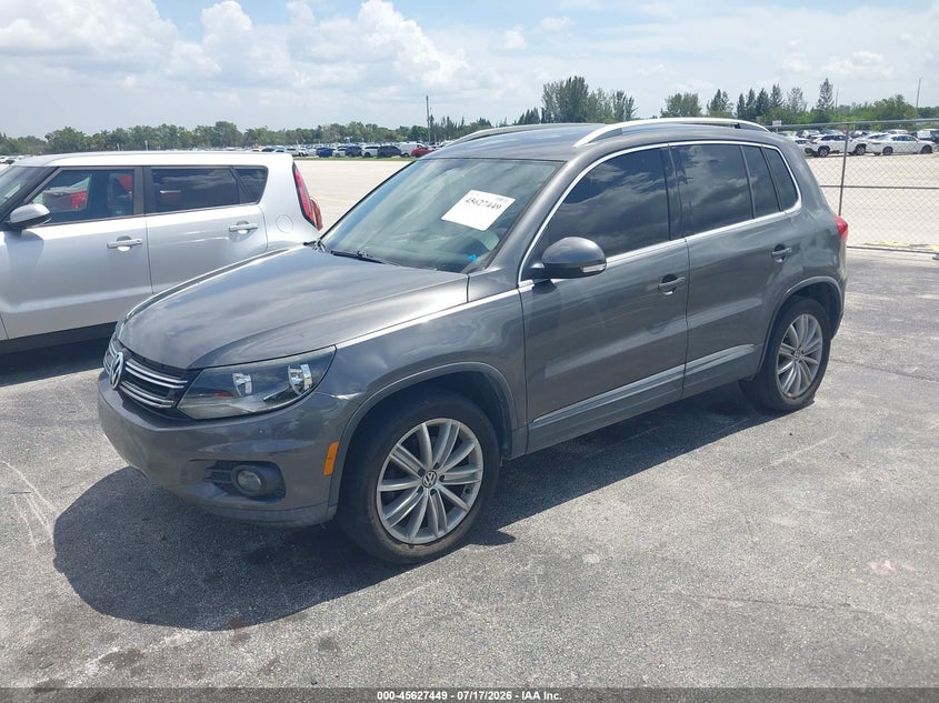 2013 Volkswagen Tiguan VIN WVGAV3AX1DW571563 IAAI salvage auction — RIGHT SIDE, Rebuildable (Florida), sold $900 on 2026-08-11 (photo 2)