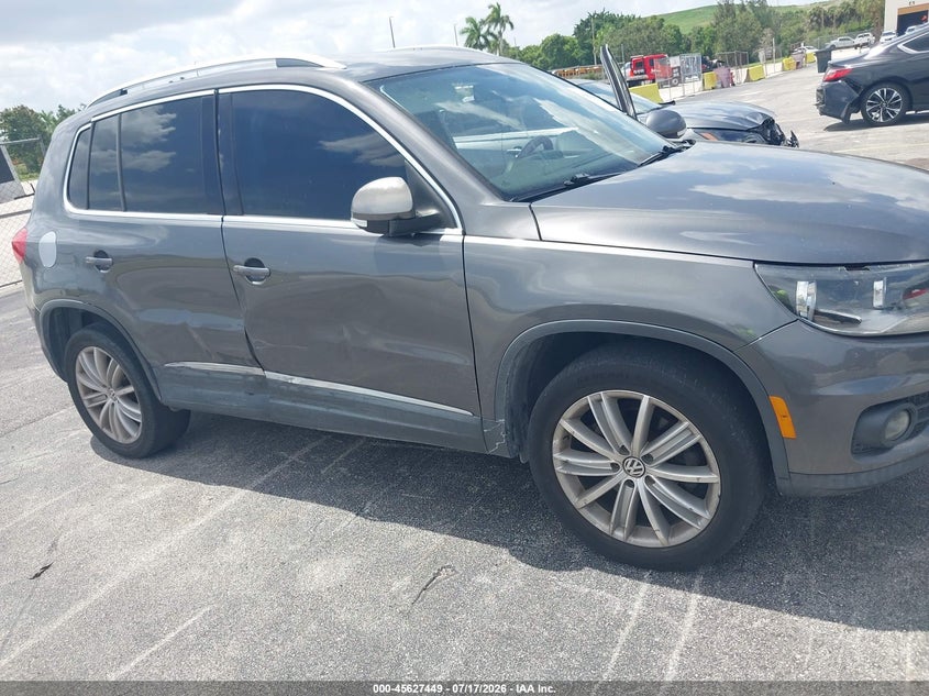 2013 Volkswagen Tiguan VIN WVGAV3AX1DW571563 IAAI salvage auction — RIGHT SIDE, Rebuildable (Florida), sold $900 on 2026-08-11 (photo 6)