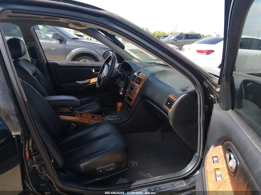 2002 Infiniti I35 VIN JNKDA31A42T027726 IAAI salvage auction — NORMAL WEAR, Original (Texas), sold $350 on 2026-07-31 (photo 5)