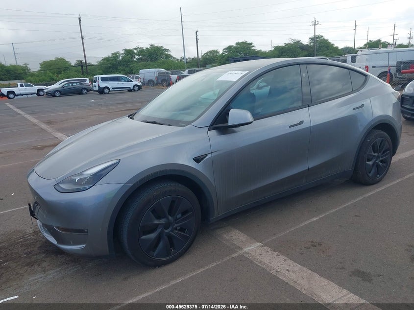 2024 Tesla Model y VIN 7SAYGDEE6RF150822 IAAI salvage auction — SIDE, Salvage (Hawaii), sold $7,000 on 2026-07-21 (photo 2)