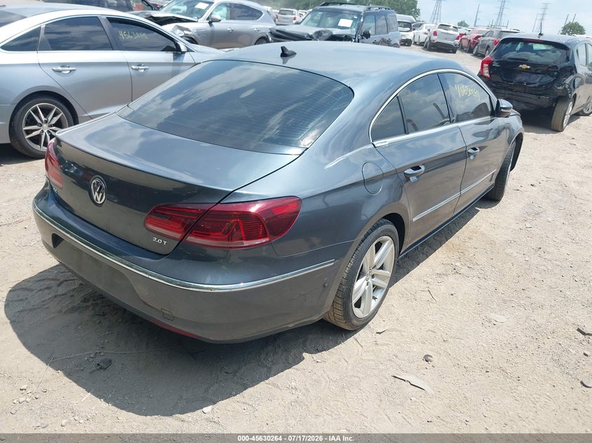 2014 Volkswagen Cc VIN WVWBP7AN9EE532123 IAAI salvage auction — NORMAL WEAR, Clear (Indiana), sold $300 on 2026-07-29 (photo 4)