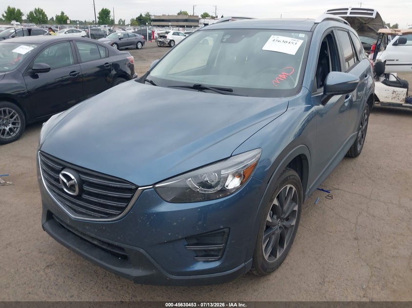 2016 Mazda Cx-5 VIN JM3KE2DY2G0650939 IAAI salvage auction — NORMAL WEAR, Clear - Dealer Only (California), sold $25 on 2026-07-22 (photo 2)