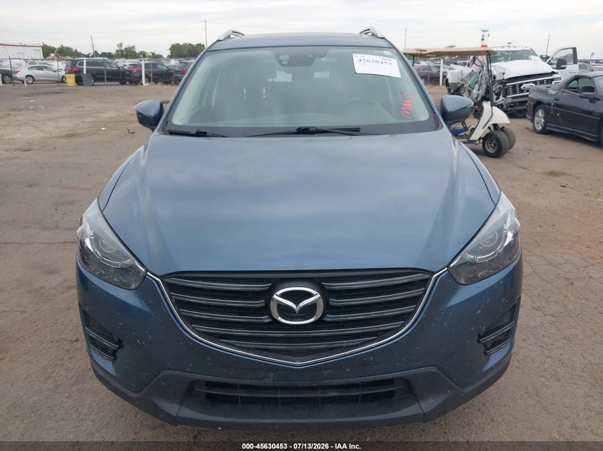 2016 Mazda Cx-5 VIN JM3KE2DY2G0650939 IAAI salvage auction — NORMAL WEAR, Clear - Dealer Only (California), sold $25 on 2026-07-22 (photo 6)