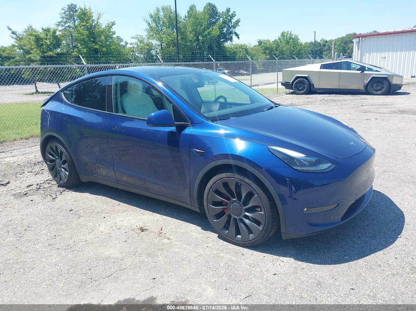 2023 Tesla Model y VIN 7SAYGDEF9PF645733 IAAI salvage auction — REAR END, Salvage Title, sold $12,100 on 2026-07-25 (photo 1)