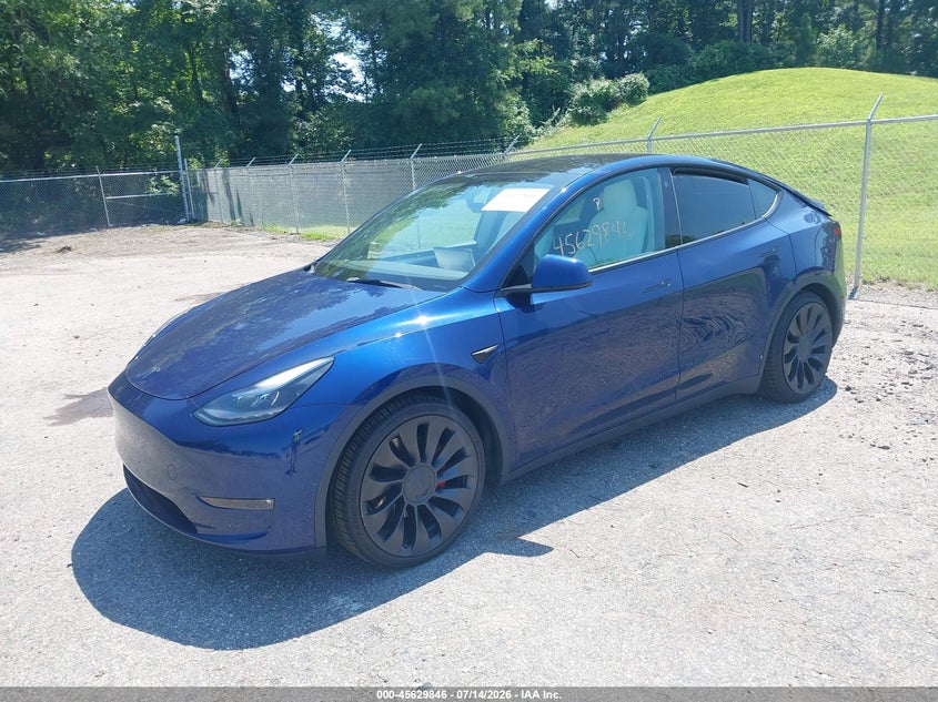 2023 Tesla Model y VIN 7SAYGDEF9PF645733 IAAI salvage auction — REAR END, Salvage Title, sold $12,100 on 2026-07-25 (photo 2)