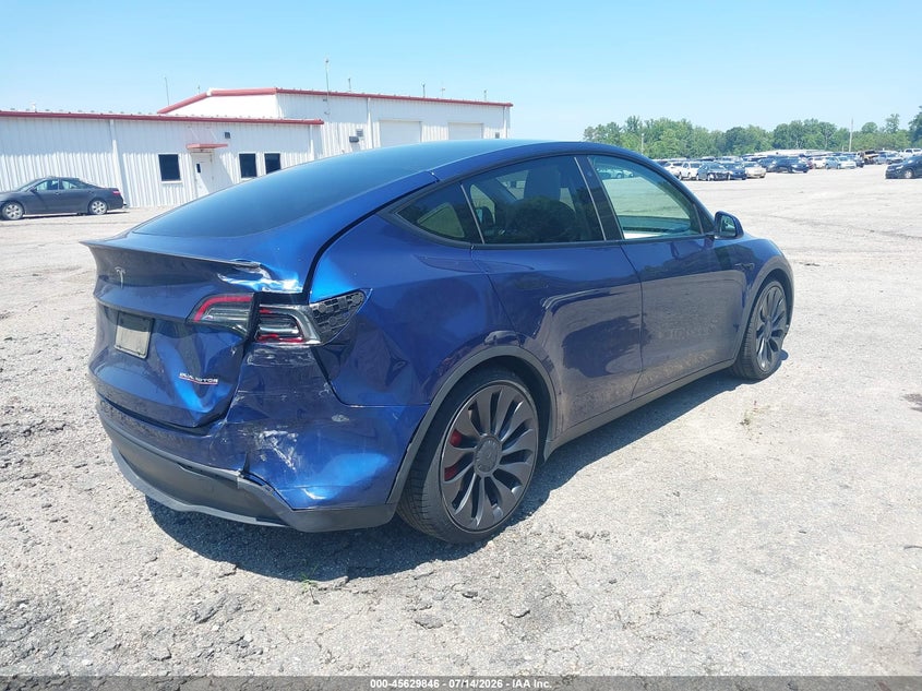 2023 Tesla Model y VIN 7SAYGDEF9PF645733 IAAI salvage auction — REAR END, Salvage Title, sold $12,100 on 2026-07-25 (photo 4)