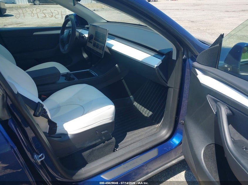 2023 Tesla Model y VIN 7SAYGDEF9PF645733 IAAI salvage auction — REAR END, Salvage Title, sold $12,100 on 2026-07-25 (photo 5)