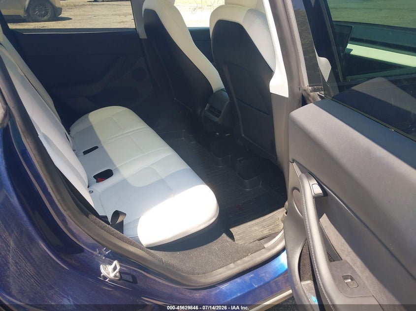 2023 Tesla Model y VIN 7SAYGDEF9PF645733 IAAI salvage auction — REAR END, Salvage Title, sold $12,100 on 2026-07-25 (photo 8)