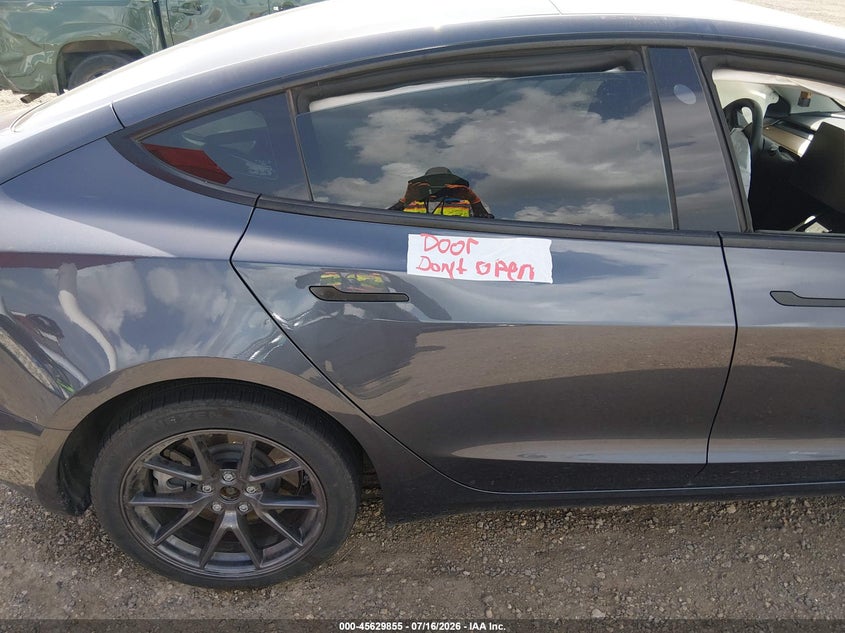 2023 Tesla Model 3 VIN 5YJ3E1EA8PF691778 IAAI salvage auction — LEFT FRONT, Salvage Title, sold $8,000 on 2026-08-26 (photo 8)