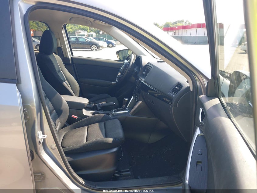 2014 Mazda Cx-5 VIN JM3KE2CY3E0410488 IAAI salvage auction — NORMAL WEAR, Clear (Maryland), sold $2,600 on 2026-07-16 (photo 5)