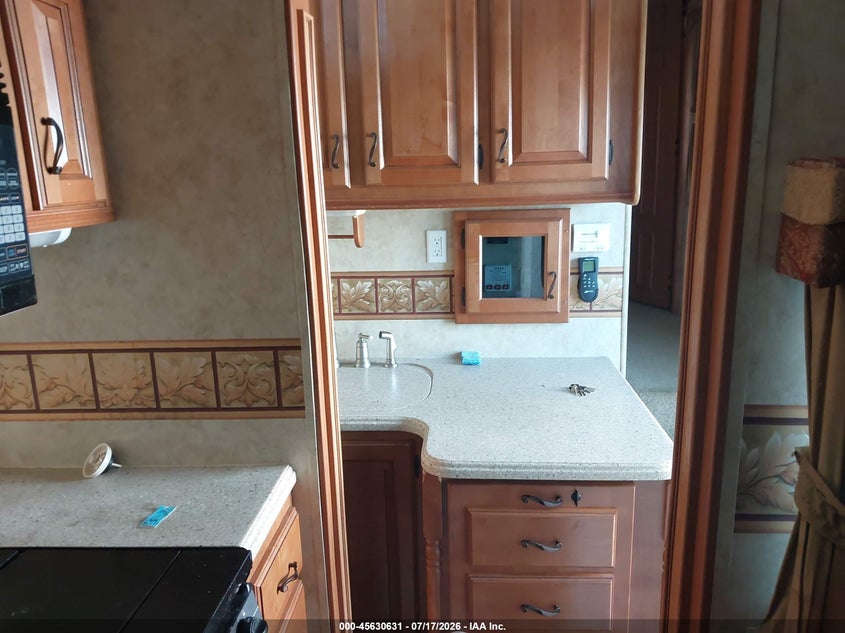 2009 Jayco Designer VIN 1UJCJ02R191SZ0200 IAAI salvage auction — STORM DAMAGE, Regular (South Dakota), sold $25 on 2026-10-07 (photo 5)
