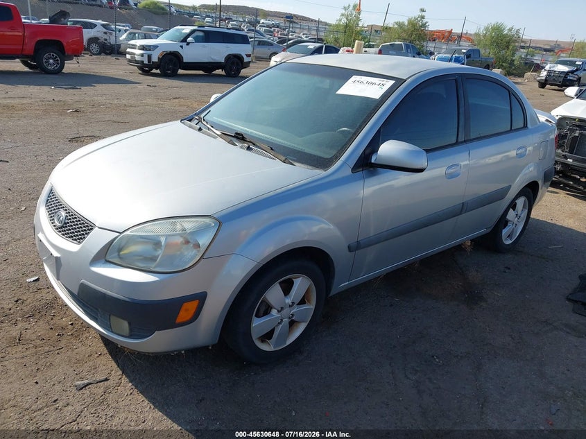 2007 Kia Rio VIN KNADE123276239067 IAAI salvage auction — NORMAL WEAR, Clear (New Mexico), sold $25 on 2026-07-29 (photo 2)