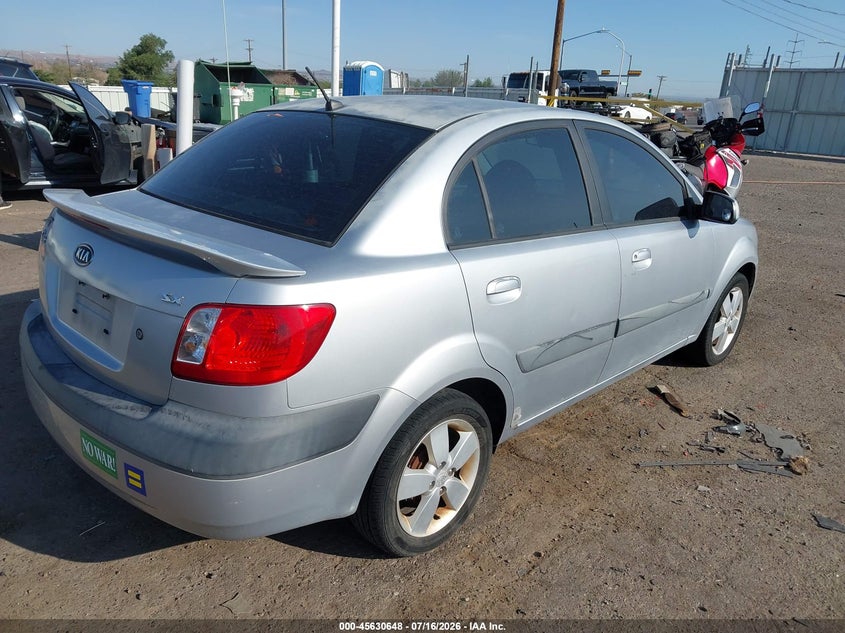 2007 Kia Rio VIN KNADE123276239067 IAAI salvage auction — NORMAL WEAR, Clear (New Mexico), sold $25 on 2026-07-29 (photo 4)