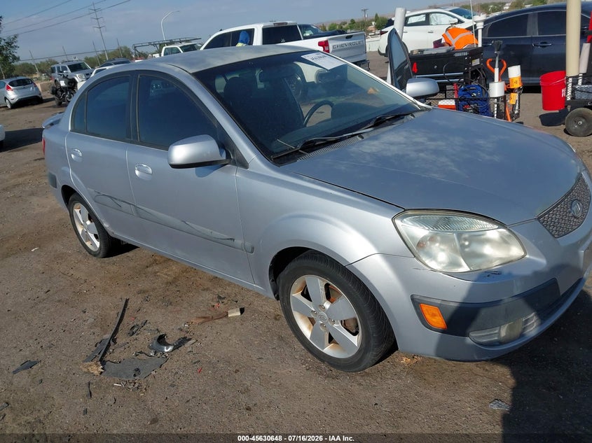 2007 Kia Rio VIN KNADE123276239067 IAAI salvage auction — NORMAL WEAR, Clear (New Mexico), sold $25 on 2026-07-29 (photo 6)