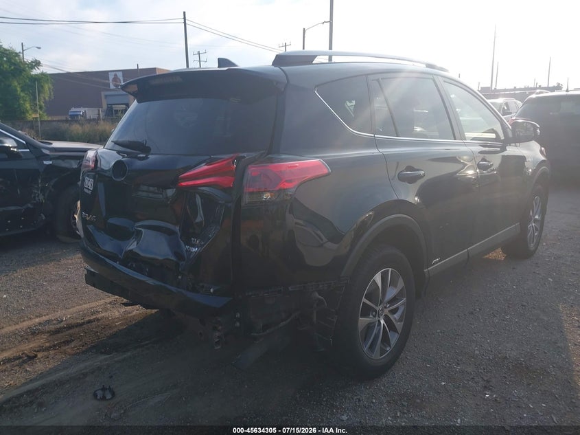 2018 Toyota Rav 4 VIN JTMRJREV9JD236038 IAAI salvage auction — FRONT & REAR, Clear (Michigan), sold $3,700 on 2026-08-02 (photo 4)