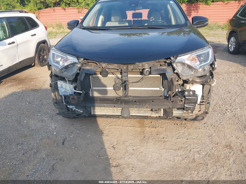 2018 Toyota Rav 4 VIN JTMRJREV9JD236038 IAAI salvage auction — FRONT & REAR, Clear (Michigan), sold $3,700 on 2026-08-02 (photo 6)