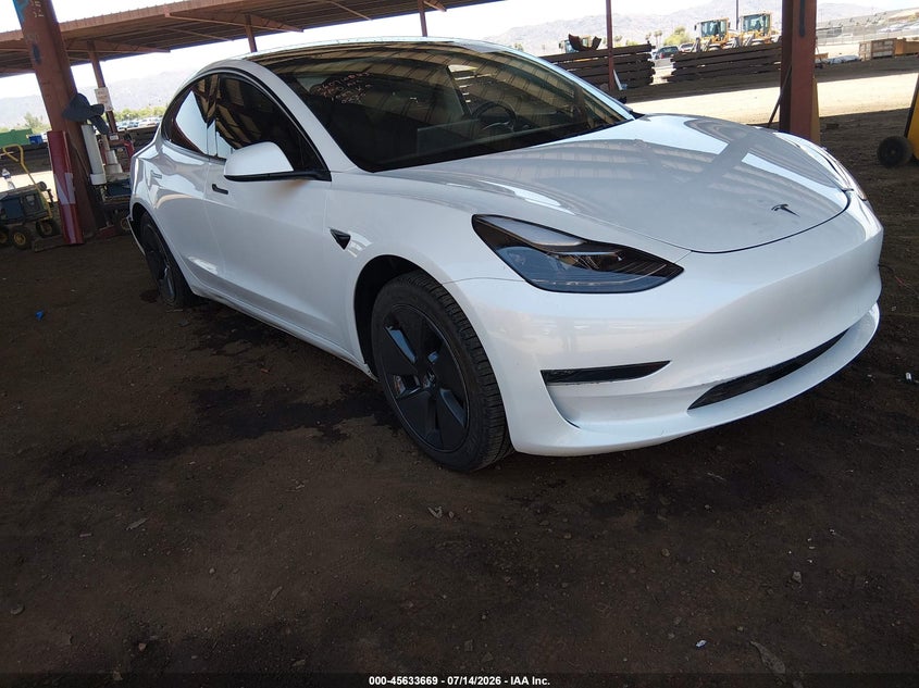 2023 Tesla Model 3 VIN 5YJ3E1EA7PF560230 IAAI salvage auction — SIDE, Salvage Title, sold $4,600 on 2026-07-29 (photo 1)