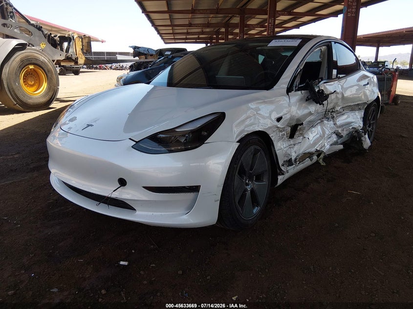 2023 Tesla Model 3 VIN 5YJ3E1EA7PF560230 IAAI salvage auction — SIDE, Salvage Title, sold $4,600 on 2026-07-29 (photo 2)
