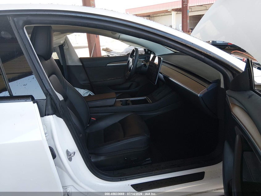 2023 Tesla Model 3 VIN 5YJ3E1EA7PF560230 IAAI salvage auction — SIDE, Salvage Title, sold $4,600 on 2026-07-29 (photo 5)