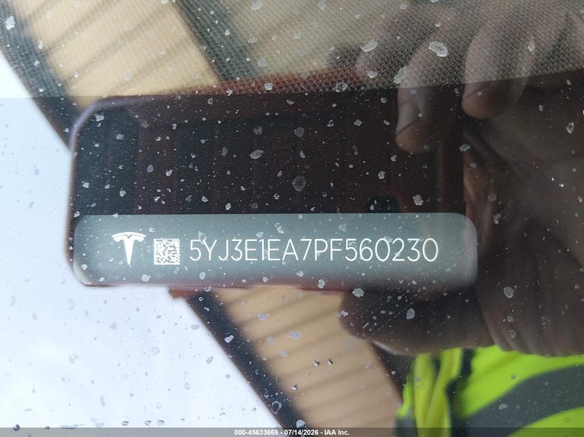 2023 Tesla Model 3 VIN 5YJ3E1EA7PF560230 IAAI salvage auction — SIDE, Salvage Title, sold $4,600 on 2026-07-29 (photo 9)
