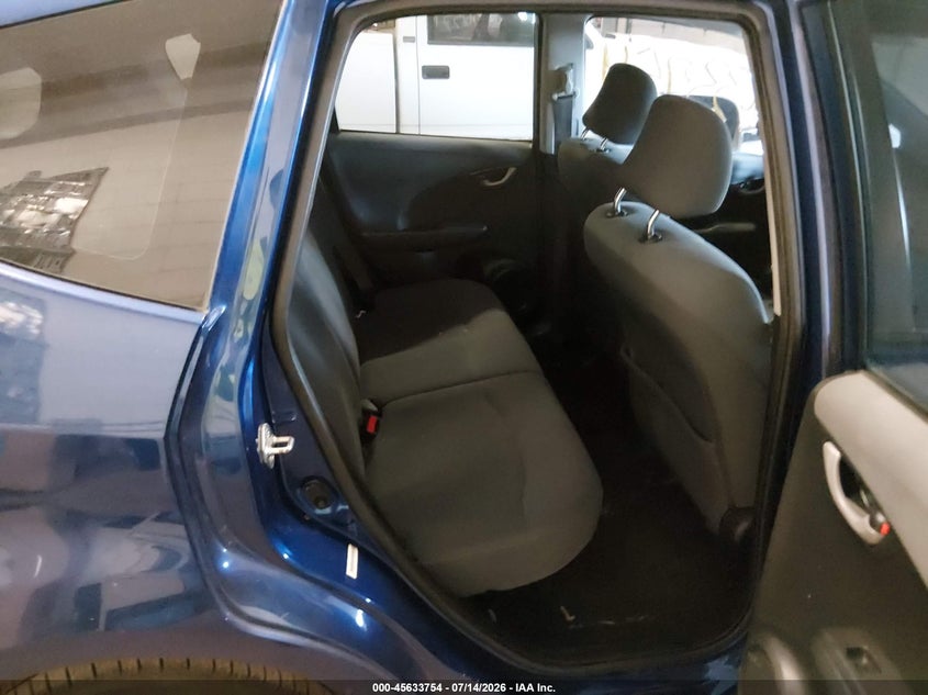 2009 Honda Fit VIN JHMGE87249C002348 IAAI salvage auction — NORMAL WEAR, Prior Salvage (Minnesota), sold $475 on 2026-07-29 (photo 8)