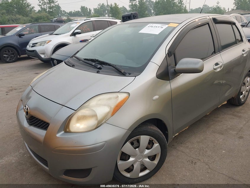 2009 Toyota Yaris VIN JTDKT903995240498 IAAI salvage auction — NORMAL WEAR, Original (Ohio), sold $75 on 2026-07-28 (photo 6)