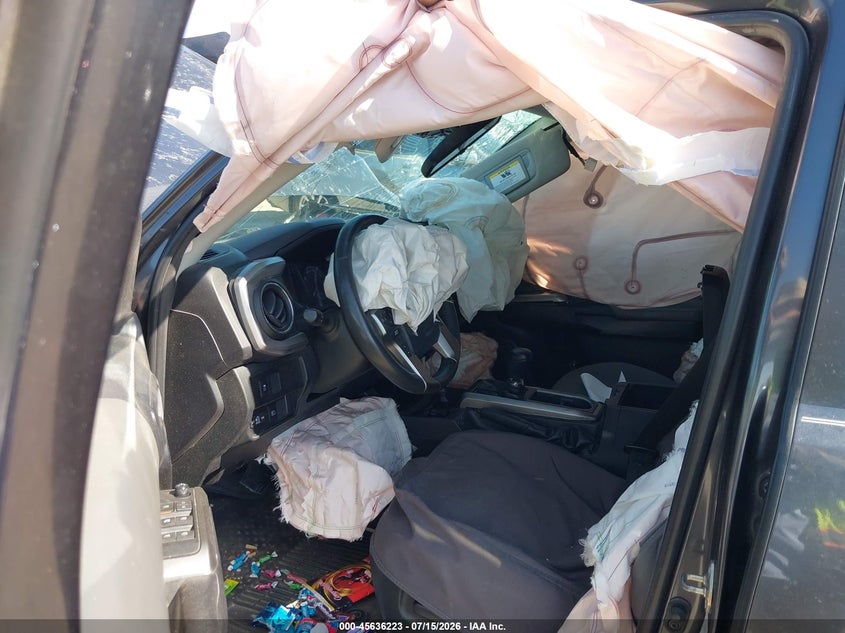 2020 Toyota Tacoma VIN 3TMCZ5AN3LM292271 IAAI salvage auction — ROLLOVER, Wait Title, sold $4,950 on 2026-08-15 (photo 5)