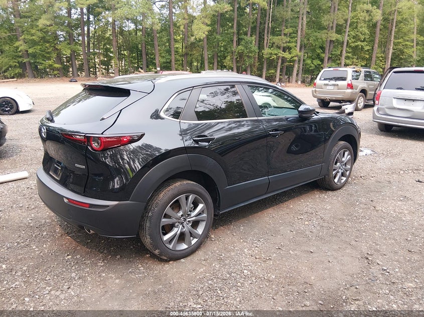 2024 Mazda Cx-30 VIN 3MVDMBCM9RM686130 IAAI salvage auction — SIDE, Salvage Title, sold $7,800 on 2026-08-29 (photo 4)
