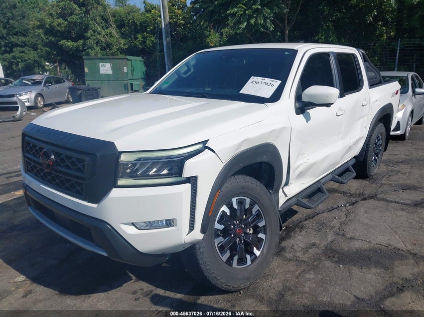 2023 Nissan Navara (frontier) VIN 1N6ED1EK6PN607122 IAAI salvage auction — SIDE, Wait Title, sold $13,100 on 2026-08-20 (photo 2)