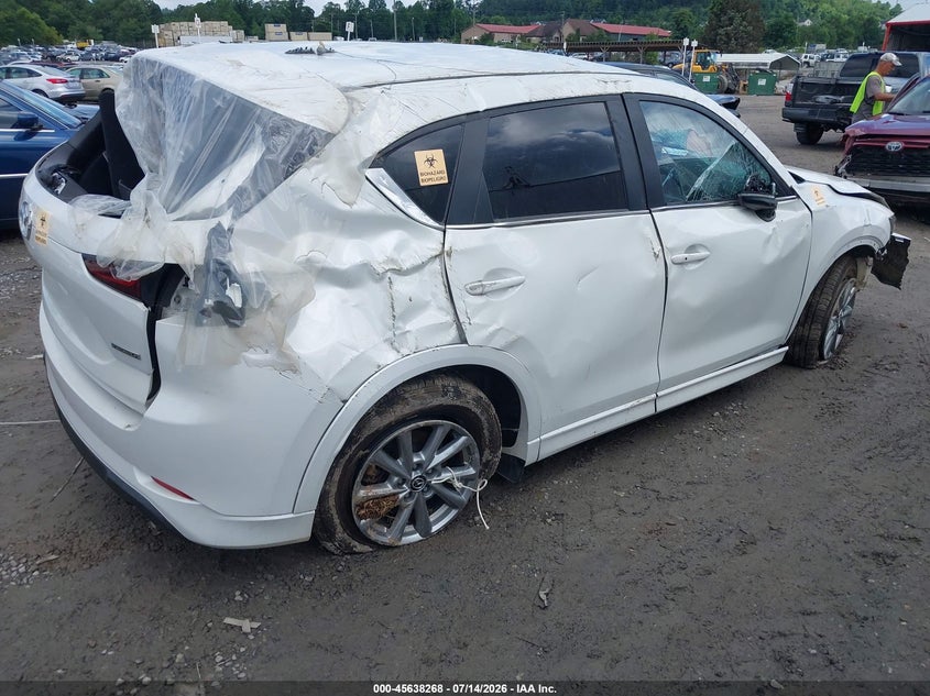 2024 Mazda Cx-5 VIN JM3KFBBM4R0354479 IAAI salvage auction — NORMAL WEAR, Salvage Title, sold $25 on 2026-07-24 (photo 4)