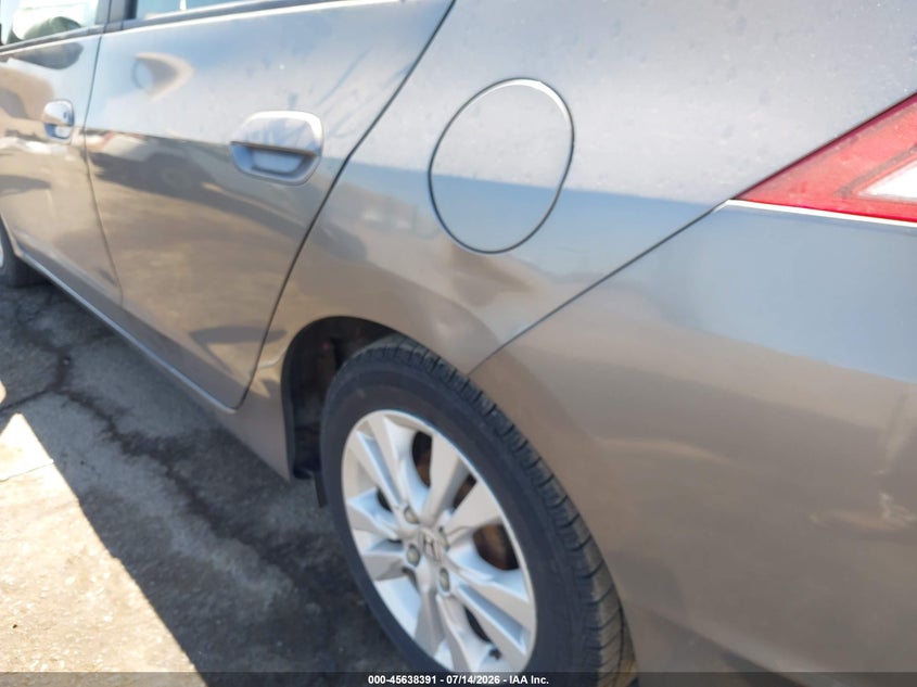 2012 Honda Insight VIN JHMZE2H7XCS000777 IAAI salvage auction — NORMAL WEAR, Salvage Title, sold $400 on 2026-07-29 (photo 6)