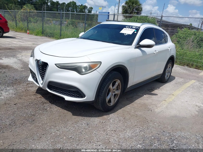 2018 Alfa romeo Stelvio VIN ZASFAKAN2J7B73855 IAAI salvage auction — SIDE, Salvage Title, sold $1,250 on 2026-09-09 (photo 2)