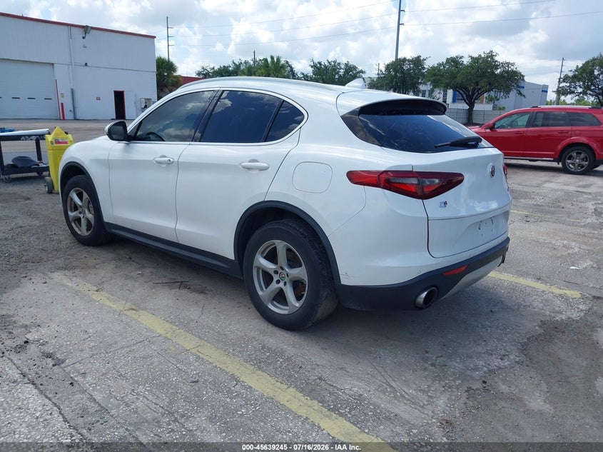 2018 Alfa romeo Stelvio VIN ZASFAKAN2J7B73855 IAAI salvage auction — SIDE, Salvage Title, sold $1,250 on 2026-09-09 (photo 3)
