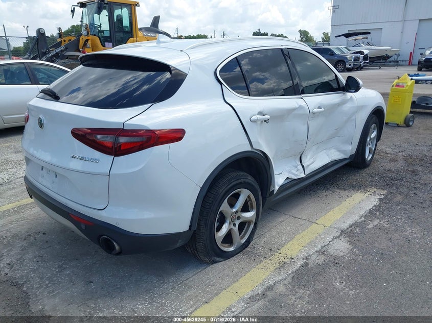 2018 Alfa romeo Stelvio VIN ZASFAKAN2J7B73855 IAAI salvage auction — SIDE, Salvage Title, sold $1,250 on 2026-09-09 (photo 4)
