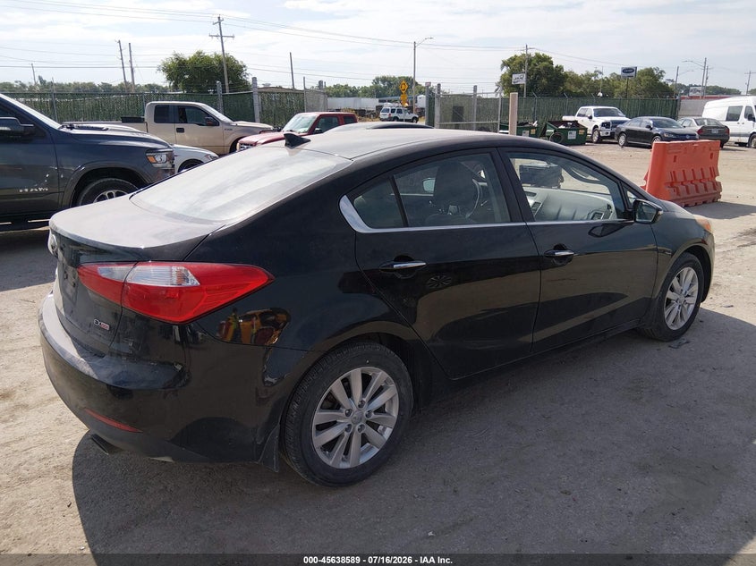 2014 Kia Forte VIN KNAFX4A84E5152162 IAAI salvage auction — NORMAL WEAR, Clear (Kansas), sold $550 on 2026-07-31 (photo 4)