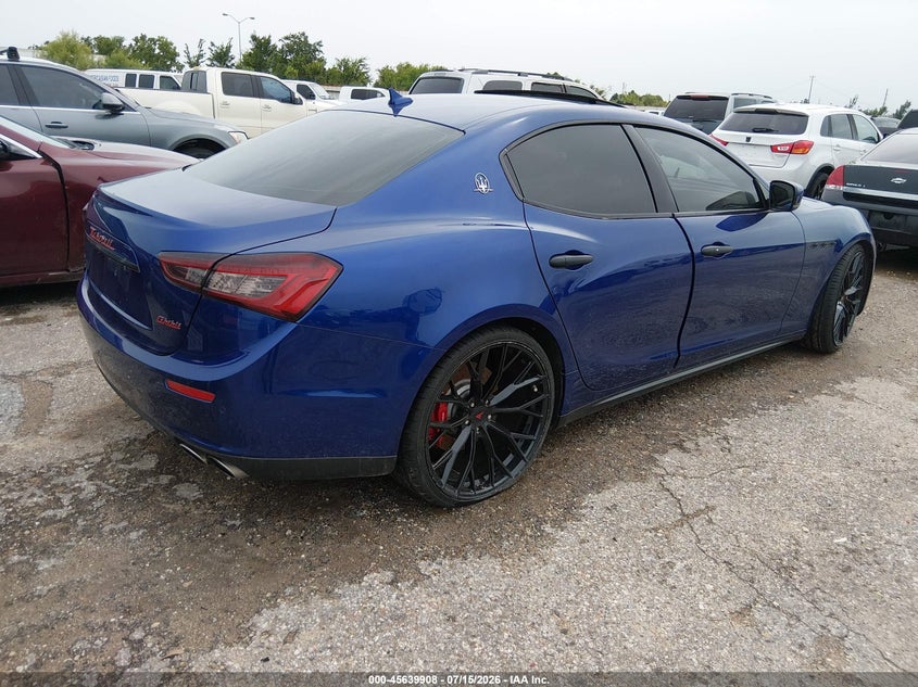 2015 Maserati Ghibli VIN ZAM57RTA5F1150985 IAAI salvage auction — NORMAL WEAR, Original (Texas), sold $5,350 on 2026-08-12 (photo 4)