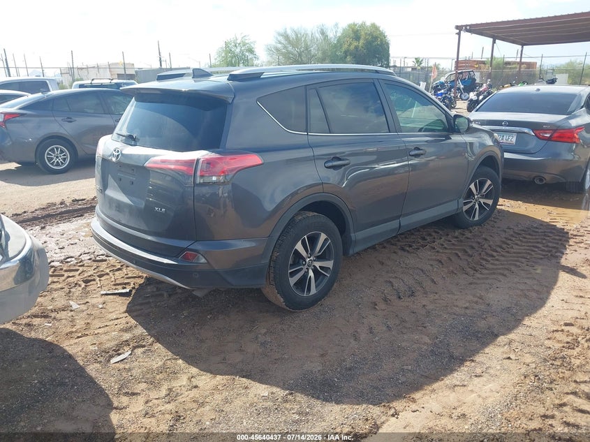 2016 Toyota Rav 4 VIN JTMWFREV9GJ084132 IAAI salvage auction — NORMAL WEAR, Salvage Title, sold $3,825 on 2026-07-30 (photo 4)