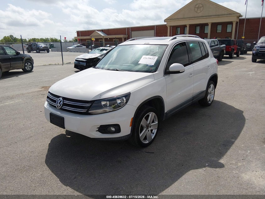 2013 Volkswagen Tiguan VIN WVGBV7AX6DW510401 IAAI salvage auction — FRONT & REAR, Original (Texas), sold $700 on 2026-07-29 (photo 2)