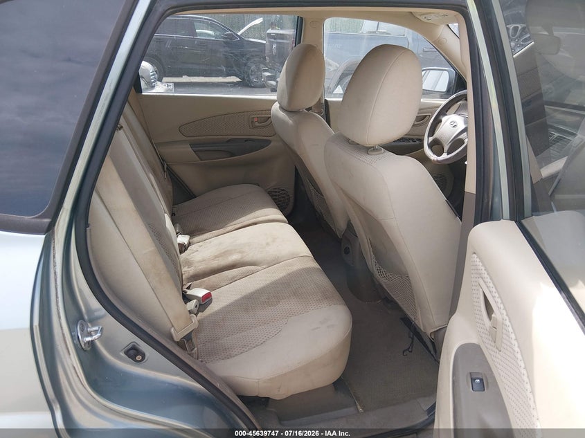 2009 Hyundai Tucson VIN KM8JM12B59U040993 IAAI salvage auction — NORMAL WEAR, Clear (Kansas), sold $275 on 2026-07-31 (photo 8)