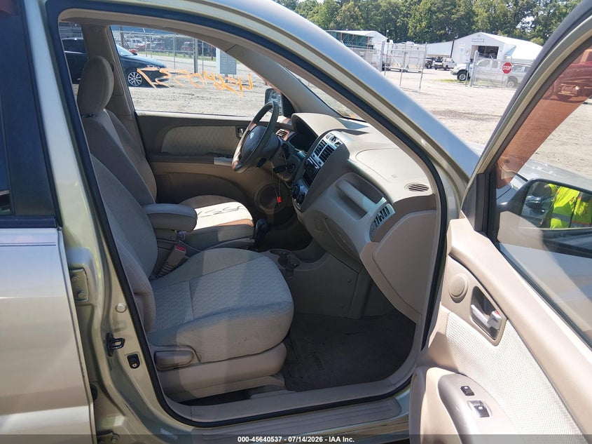 2007 Kia Sportage VIN KNDJF723177419348 IAAI salvage auction — NORMAL WEAR, Clear (Virginia), sold $375 on 2026-07-31 (photo 5)