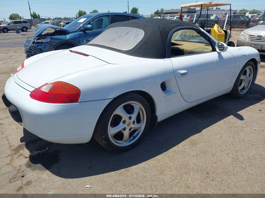1999 Porsche Boxster VIN WP0CA2988XU630981 IAAI salvage auction — NORMAL WEAR, Clear - Dealer Only (California), sold $1,625 on 2026-08-05 (photo 4)