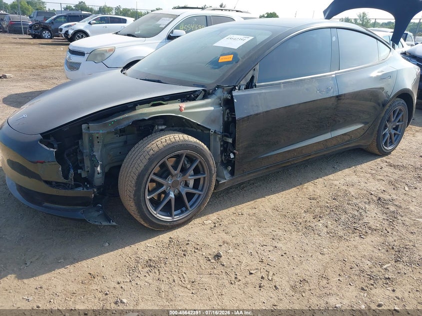 2022 Tesla Model 3 VIN 5YJ3E1EB3NF174376 IAAI salvage auction — SIDE, Salvage (Ohio), sold $7,600 on 2026-08-02 (photo 2)