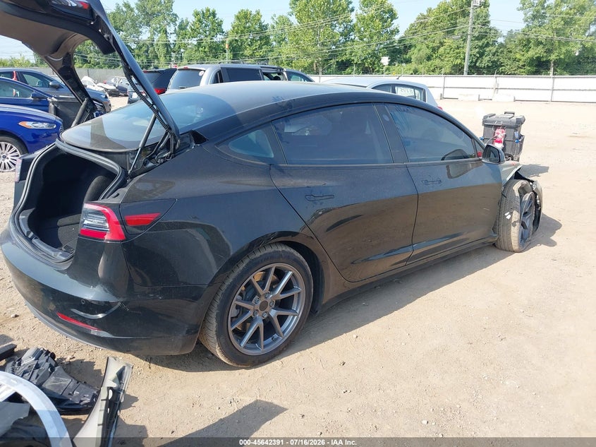 2022 Tesla Model 3 VIN 5YJ3E1EB3NF174376 IAAI salvage auction — SIDE, Salvage (Ohio), sold $7,600 on 2026-08-02 (photo 4)