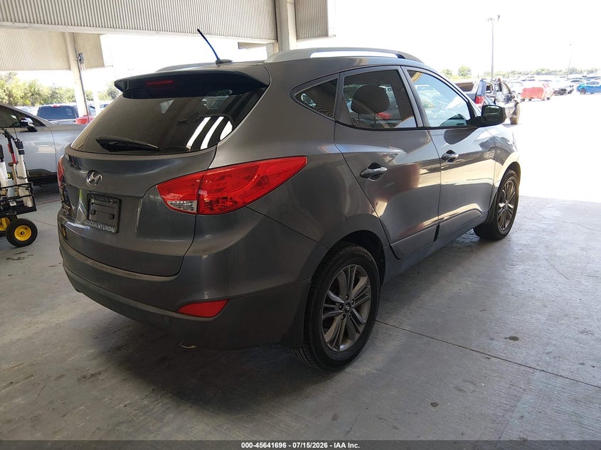 2014 Hyundai Tucson VIN KM8JU3AGXEU927900 IAAI salvage auction — NORMAL WEAR, Clear (Florida), sold $1,750 on 2026-07-22 (photo 4)